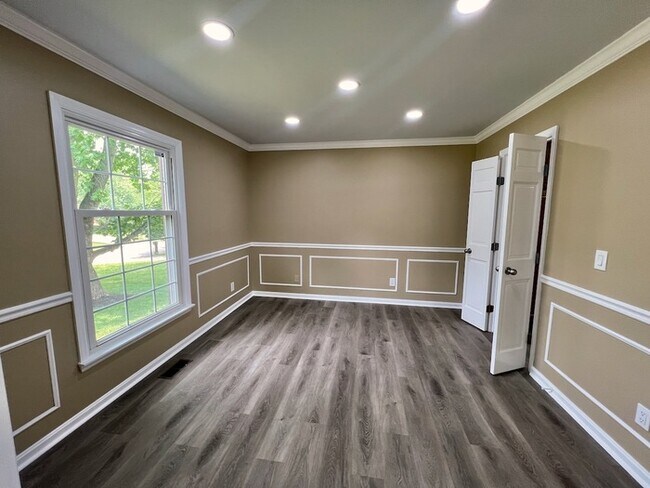 Building Photo - Unique 2 Story with Room for All! Finished...