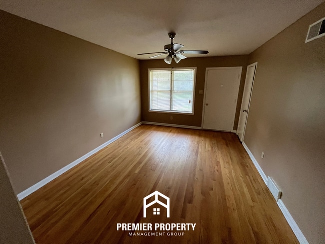 Photo - 3BR/1.5BA Memphis Rental with Tile Flooring, Brick Fireplace & Fenced Yard House