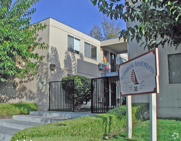 Building Photo - Riverbank Apartments