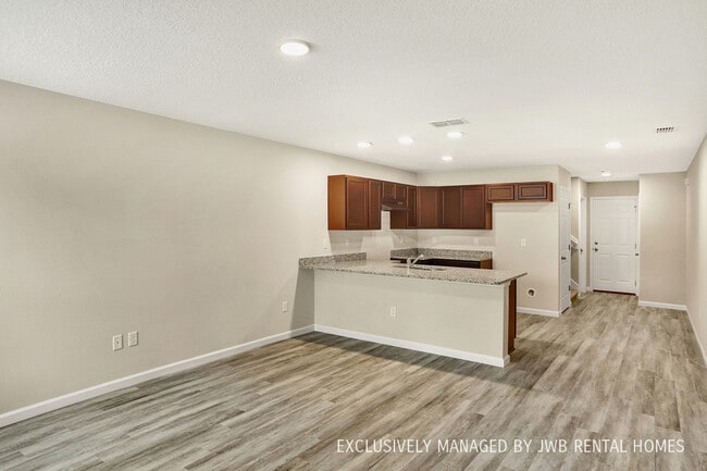 Building Photo - 8518 McGirts Village Ln