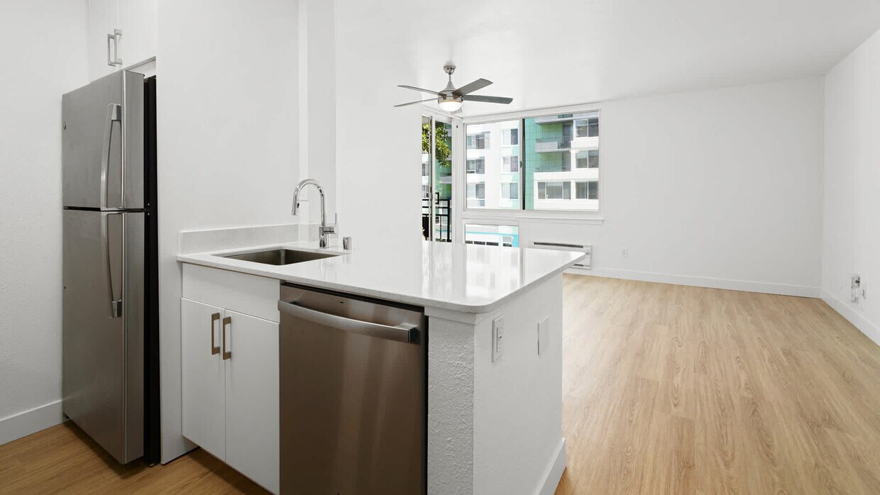 Cocina con electrodomésticos de acero inoxidable - SoMa Square