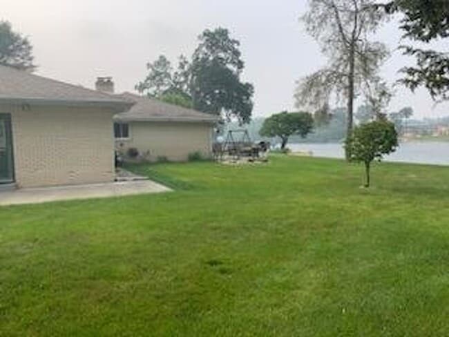 Building Photo - River Front Home in Elkhart IN, lawn care included.