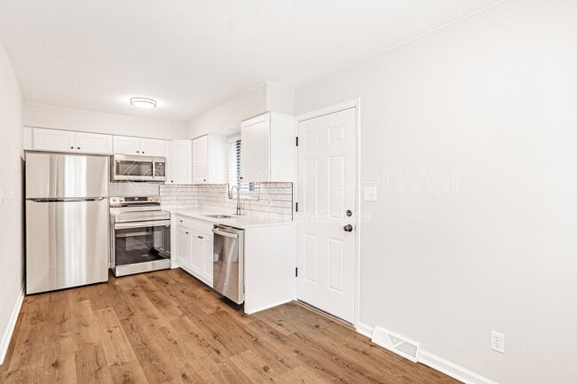 Photo - 4762 S Acoma St Apartment