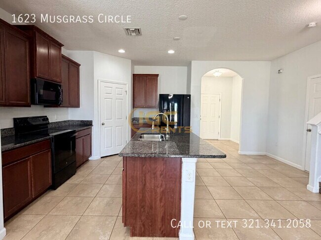 Building Photo - 1623 Musgrass Cir