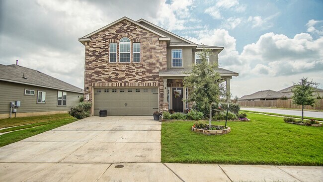 front of home with covered porch - 272 Lillianite