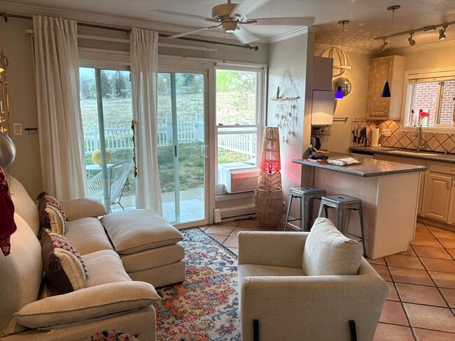 Building Photo - One Bedroom Condo Walking Distance to CU with Fenced Backyard and Flatiron Views!