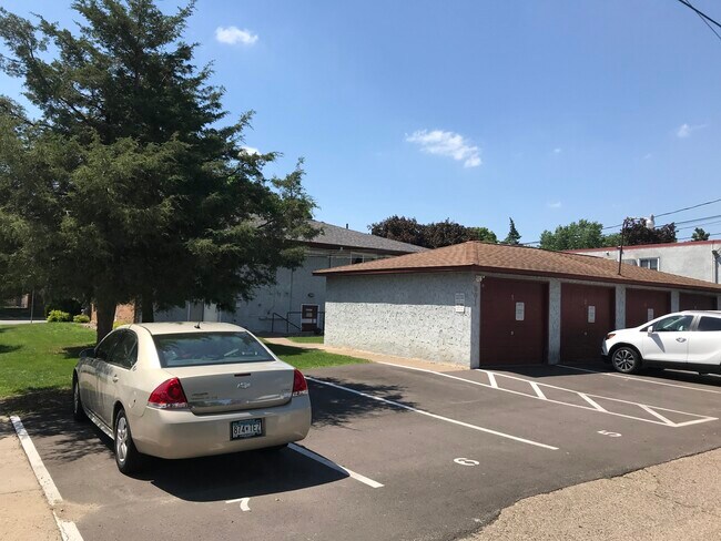 4-car garage and private parking lot. - 601 Monroe St NE