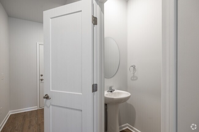 3 habitaciones, 2.5 baños - 1353 pies cuadrados - Medio baño - Pine Grove Townhomes