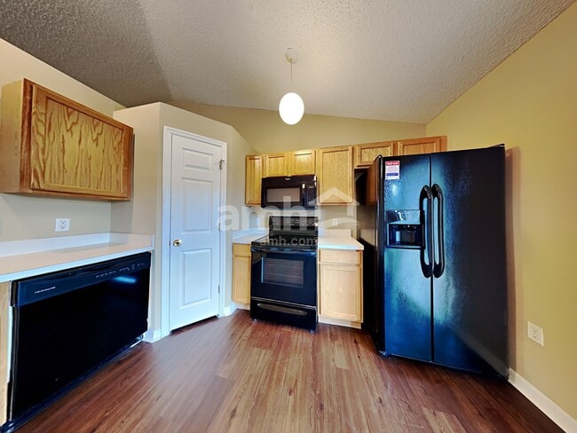 Building Photo - 6679 Gentle Oaks Dr W