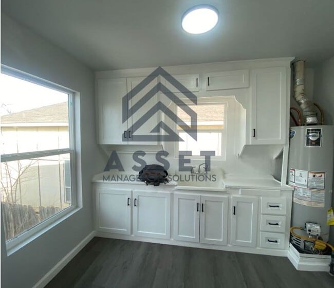 Photo - Modern 1-Bedroom Apartment with Thoughtful...