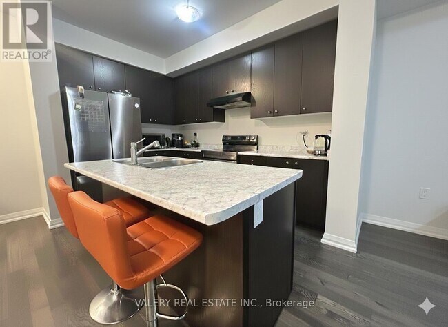 Photo du bâtiment - 90 Norwich Cres