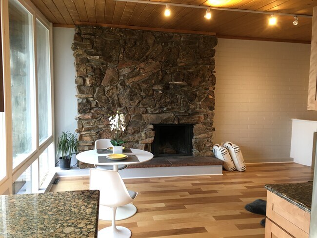 large moss-rock wall - 3407 Stanford Ave
