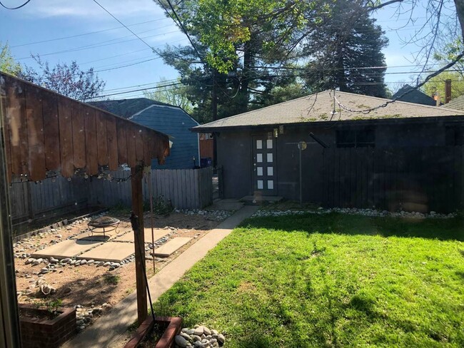 Enjoy outdoors in the backyard, perfect for entertaining! - 576 S Grant St