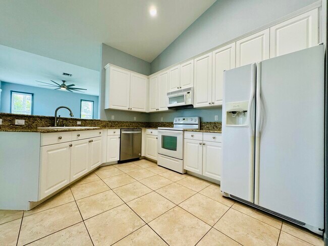 Foto del edificio - 6126 NW E Deville Cir