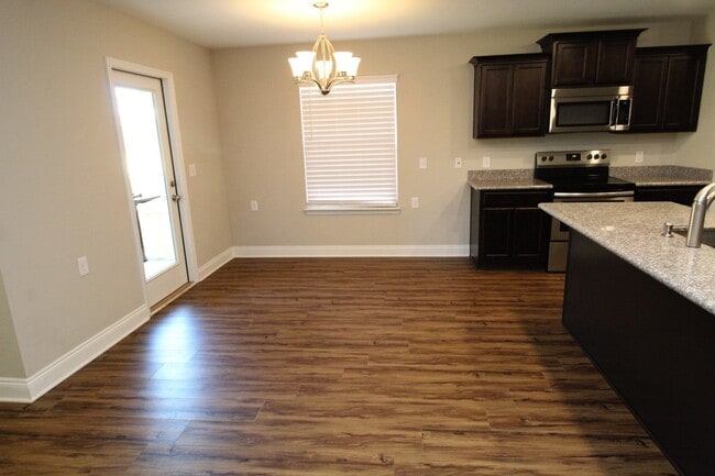 Building Photo - Coming Soon! 3-Bed/2-Bath Brick Home in Mi...