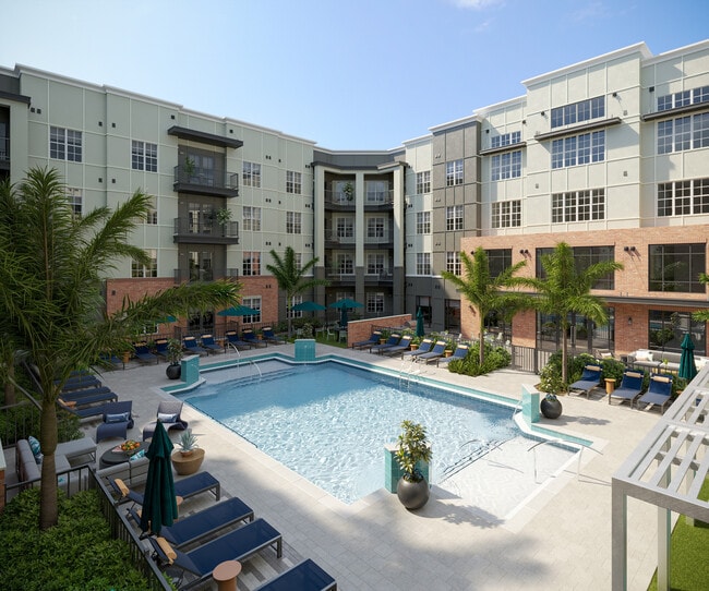 Piscina cristalina con cabañas y tumbonas - Evelyn City Lofts