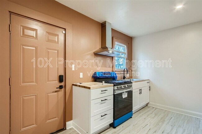 Building Photo - 1099 E 16th Ave