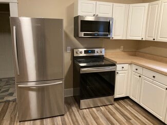 Kitchen with stainless steel appliances - 1417 N Hamilton Ave