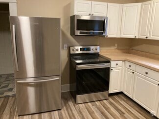 Kitchen with stainless steel appliances - 1417 N Hamilton Ave