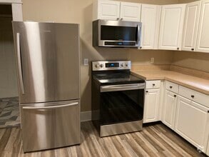 Kitchen with stainless steel appliances - 1417 N Hamilton Ave