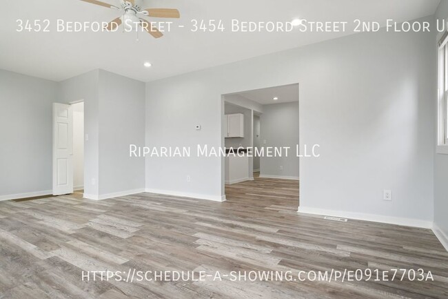 Building Photo - Beautiful upper unit lease