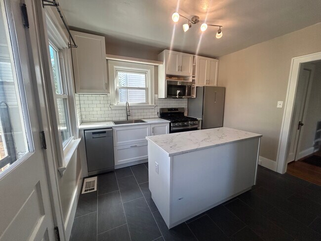 Newly Remodeled Kitchen with Stainless Steel Appliances, Island, Tiled Floors & Breakfast Nook - 4524 Orkney Ave
