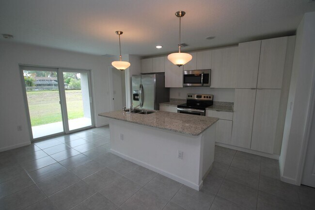 Foto del edificio - Stunning 4BR/2BA Palm Bay Retreat with Modern Upgrades & Oversized Lot!!