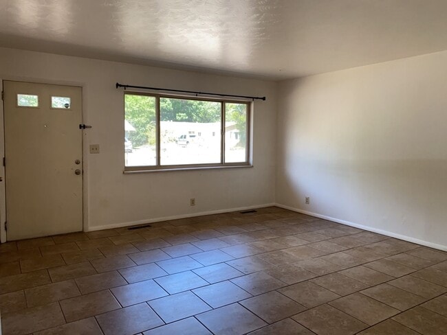 Building Photo - STUDENTS WELCOME! Sprawling Ranch Home w/ Large Fenced Yard