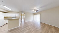 Located at 3703 Wurzbach Rd in San Antonio, Texas, this 2-bedroom, 2-bathroom residence is thoughtfully laid out on a single floor. Light-toned wood-style flooring flows consistently throughout the home, creating a cohesive and clean aesthetic. Ceiling fans are installed in the main living areas and bedrooms, providing both comfort and a finishing touch to each room.

The open living room is generously sized, bathed in natural light from multiple windows fitted with blinds, and features a sliding glass door that adds additional brightness and outdoor access. The kitchen is well-appointed with white cabinetry, granite-style countertops, a full suite of white appliances including a refrigerator, electric range, and built-in microwave, along with ample storage and a stainless steel sink.

The primary bedroom offers a comfortable footprint with a large double-door closet and a window overlooking the exterior. Its en-suite bathroom includes a vanity with granite-style countertops, overhead cabinetry, and a walk-in shower. The second bedroom is bright and well-sized with its own ceiling fan. The second bathroom is equipped with a full tub-shower combination and grab bars for added accessibility. A hallway and closet complete the functional layout of this well-maintained San Antonio home.