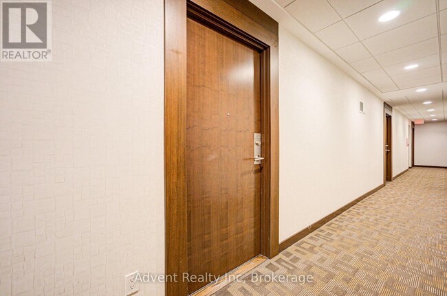Building Photo - 181-2181 Village Green Square