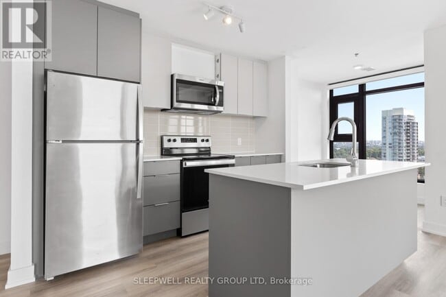 Building Photo - 1354 Carling Ave