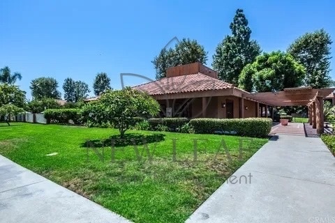 Photo - 6600 Warner Ave Townhome
