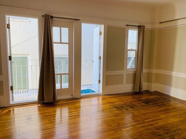Bedroom has doors that open to fire escape. Great air circulation. - 779 Bush St