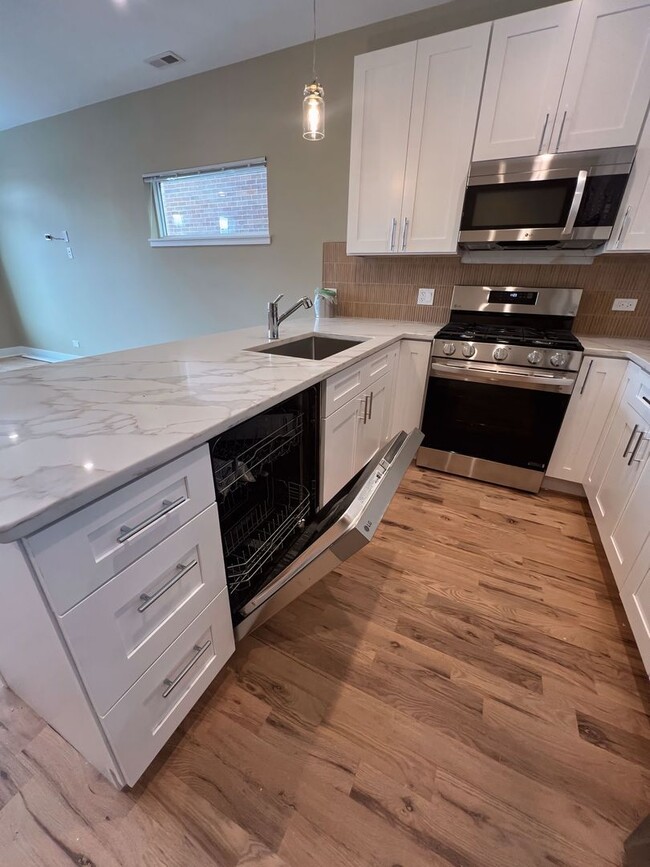 Building Photo - 4231 S Champlain Ave