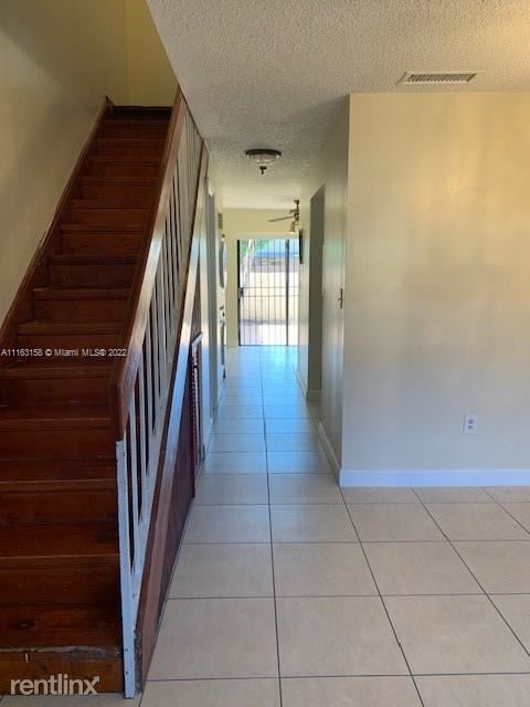 Building Photo - 2 br, 1.5 bath Townhome - 13270 SW 58th Te...