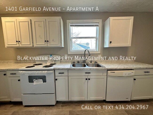 Foto del edificio - Move In Special! 1/2 First Full Months Ren...