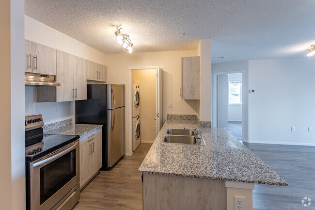 3 chambres, 2 salles de bain - Pinnacle III - 94 m² - Cuisine - Maple Crest Place