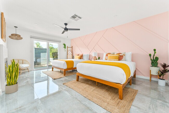The fun never stops in the bedroom with two queen beds.Enjoy the tropical setting of the second bedr - 2104 N Volturno Rd