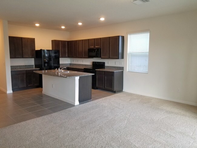 Foto del edificio - 6917 Breezy Palm