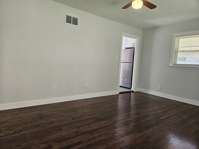 Building Photo - 1217 W 63rd Ave