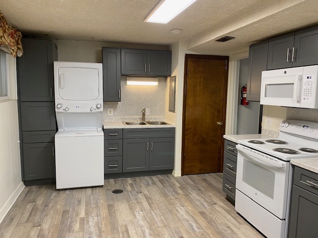 Kitchen with washer/dryer - 20683 Antrim Dr