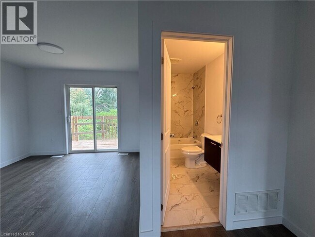 Building Photo - 107 HighRiver Trl