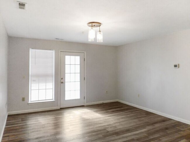 Building Photo - Recently Updated 1st Floor Condo with Priv...