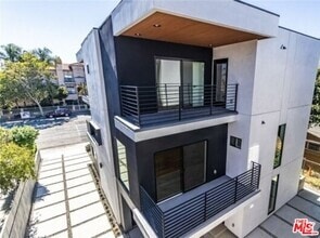 Building Photo - 5638 Woodman Ave