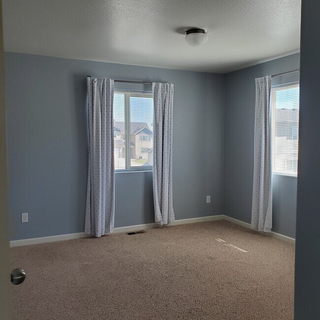 Foto del edificio - 3 BED 2.5 BATH SADDLE RIDGE TOWNHOME