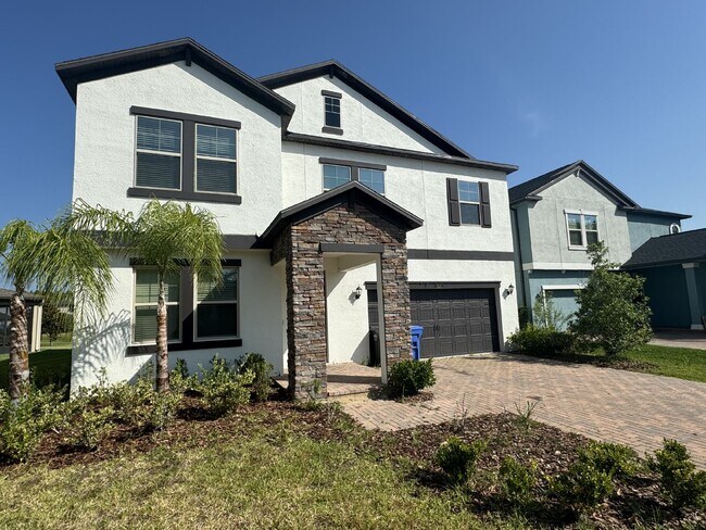Building Photo - Modern 4 Bedroom Tampa Palms Rental Home w...