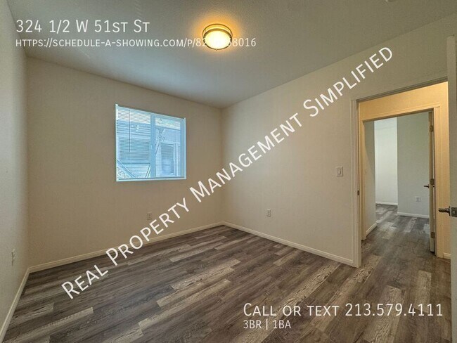 Building Photo - 324 1/2 W 51st St-