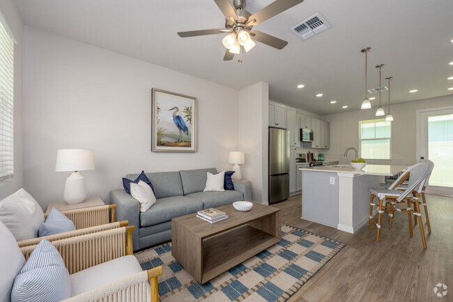 A5 1BR, 1BA - 712SF - Living Room and Kitchen - The Eleanor at Daytona Beach