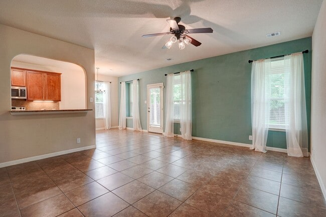 Building Photo - Bright & Roomy 4BR • 2.5BA • Two-Level Living