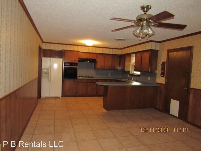 Building Photo - 3 br, 1.5 bath House - 415 NW Woodland Drive